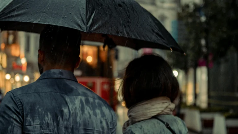 The Symbolism of Umbrellas in Romantic Scenes